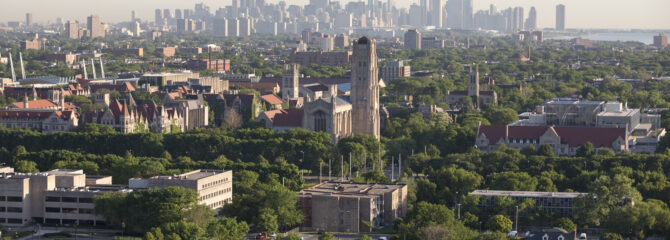 An aerial view of the campus facing northwest with downtown Chicago in the background. (Photo by Tom Rossiter/The University of Chicago)